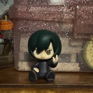 Action Figure with Green Hair